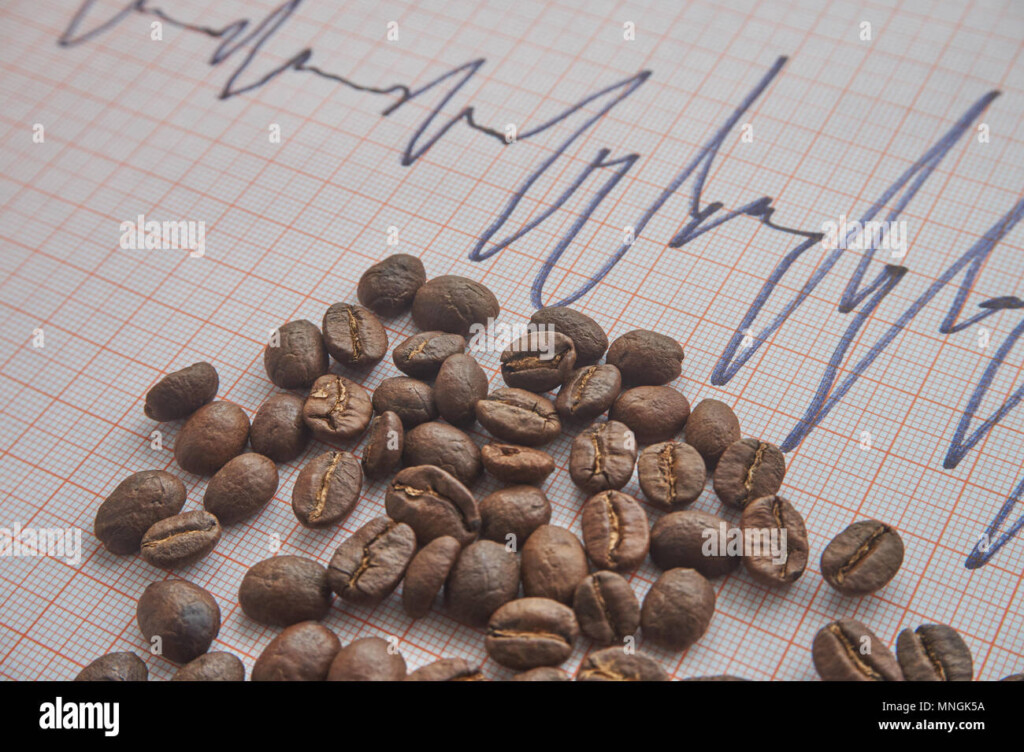 Loose Roasted Coffee Beans On An ECG Tracing Showing An Increased Heart 