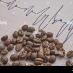 Loose Roasted Coffee Beans On An ECG Tracing Showing An Increased Heart